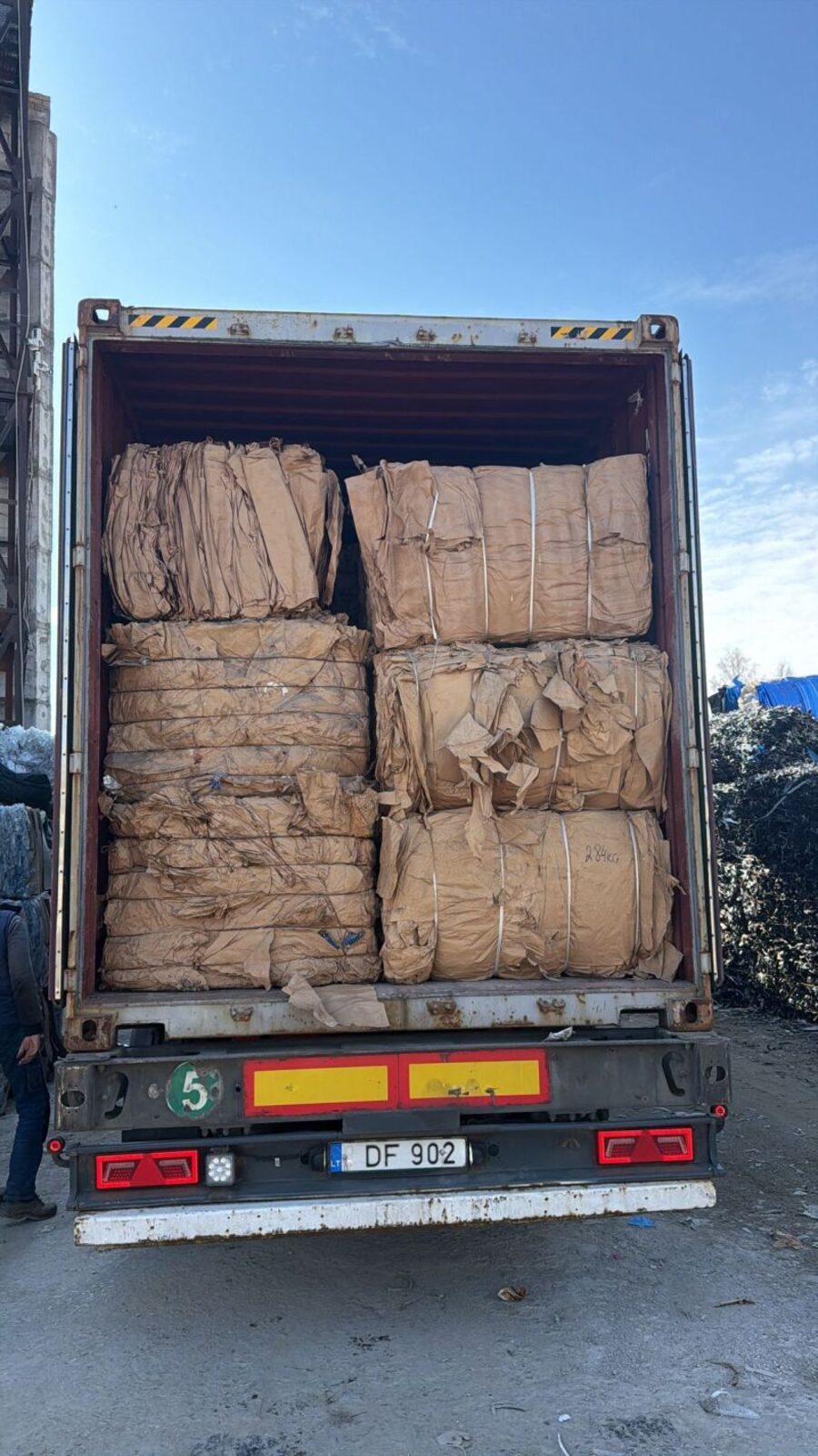 Kraft paper bales stowed for departure.